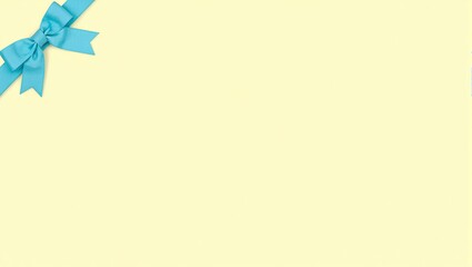 Elegant turquoise bow on yellow background sunny and inviting