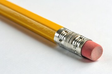 Close-up of a yellow pencil with the eraser end, office stationery, pencil top, yellow pencil,