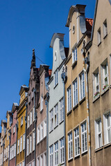 Facades of historic houses in Swietego Ducha street of Gdansk, Poland