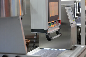 blister packing machine in pharmaceutical factory