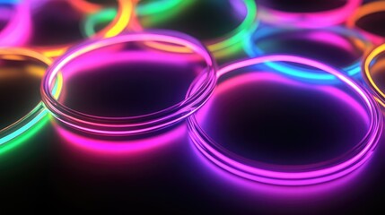 Vibrant Neon Circles in Pink Blue and Green Colors on Dark Surface with Soft Focus Depth of Field for Abstract Background Concept