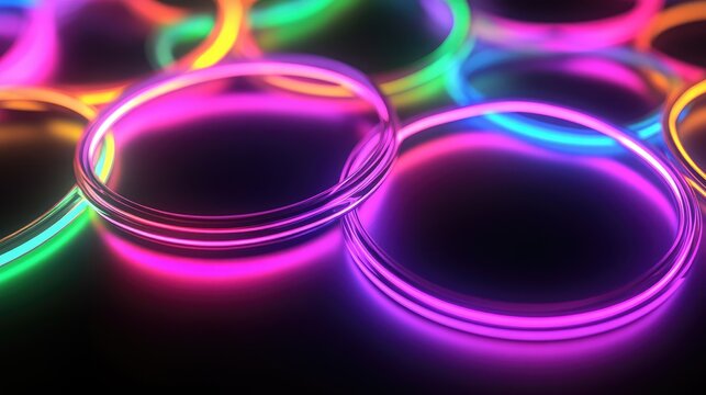 Vibrant Neon Circles in Pink Blue and Green Colors on Dark Surface with Soft Focus Depth of Field for Abstract Background Concept