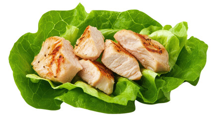 Grilled chicken pieces served on a bed of fresh green lettuce.