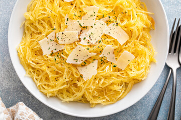Spaghetti squash roasted and pulled apart served with olive oil and parmesan