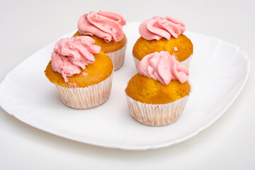 Pink Frosted Cupcakes, Sweet Treats, Cupcake Delights, A Bite of Happiness, Sweet Indulgence, Cloud-like Frosting, Bakery Fresh, Perfect for Any Occasion, Sweeten Your Day.