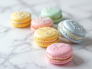 Still life of colorful macarons with white piped designs on a marble surface under soft light