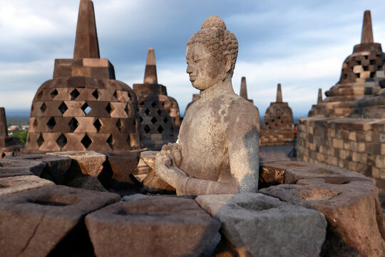 Stone Buddha statue, Borobudur, 9th-century Mahayana Buddhist temple, UNESCO, Java, Indonesia