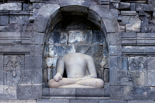 Stone Buddha statue, Borobudur, 9th-century Mahayana Buddhist temple, UNESCO, Java, Indonesia
