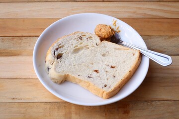 Sliced loaf bread and fruit breakfast food and peanut butter