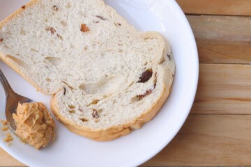 Sliced loaf bread and fruit breakfast food and peanut butter