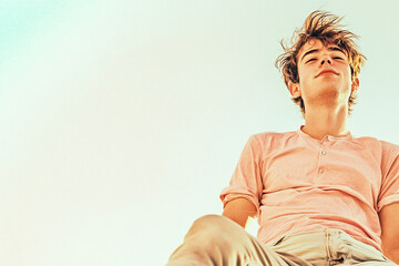 portrait of a young blond manon white background