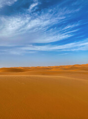 sand dunes and blue sky in erg chebbi desert