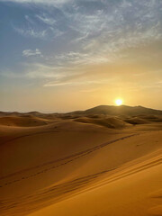 sunset on sand dunes of a desert, Morocco