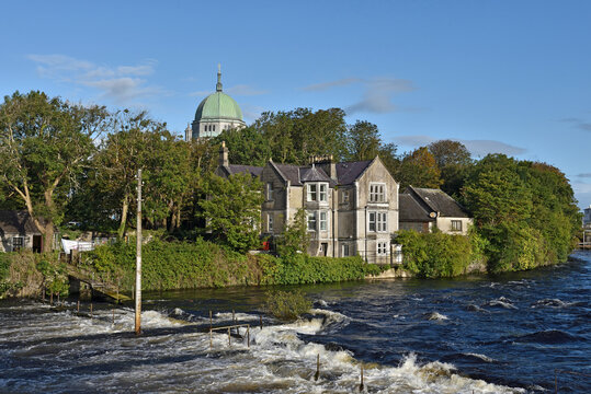 Corrib River with the dome of the Cathedral in the background, Galway, Connemara, County Galway, Connacht, Republic of Ireland