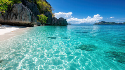 Obraz premium scenic tropical lagoon with clear turquoise water, surrounded by rocky cliffs and lush greenery, creating serene and inviting atmosphere