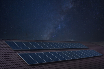Rooftop solar panels for green energy Rooftop solar panels for factories Solar panels absorb sunlight Starry sky backdrop at night © eakarat