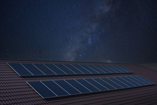Rooftop solar panels for green energy Rooftop solar panels for factories Solar panels absorb sunlight Starry sky backdrop at night