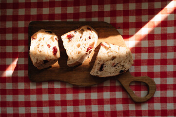homemade cranberry bread on a board