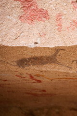 Vertical Image of Rock ledge on Rio Pinturas where famous rock paintings of handprints and animals are located. Location: Cueva de las Manos, UNESCO World Heritage Site, Patagonia, Argentina