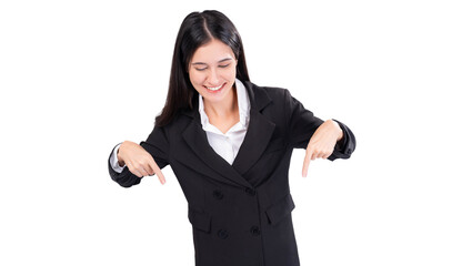 Cheerful young business woman in a black suit, smiling as she points downward with both hands. This image is ideal for emphasizing text, offers or promotional content