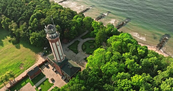 Lighthouse by Baltic sea at summer in Poland.