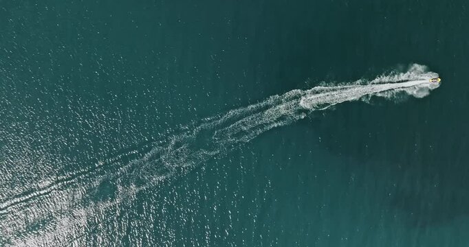 Sea waves created by a jet ski at Baltic Sea.