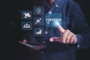 A businessman interacts with digital icons representing financial technology, the evolution of finance through innovative solutions, data analytics, check financial online data. fintech concept