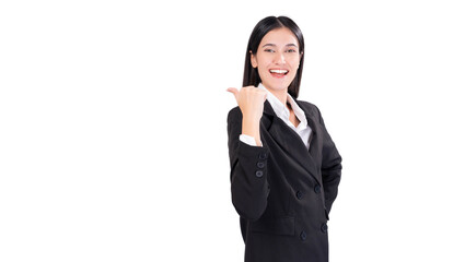 Happy Young business woman in a black suit, smiling confidently while pointing to copy space. Making it ideal for business, marketing or corporate themes
