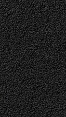 Fototapeta premium Softly textured charcoal gray surface with gentle, almost imperceptible highlights, offering a quiet, minimalist aesthetic with a touch of elegance