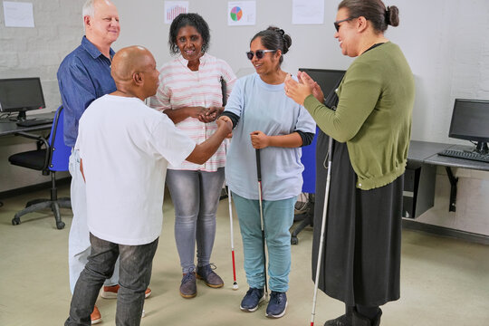 Visually impaired people in office