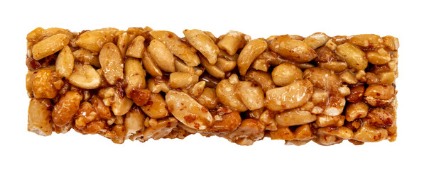 Bar with peanuts, hazelnuts, caramel and chocolate on a white background. View from above. Nut bar isolate. Sugar