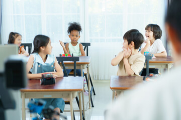Group of diverse children enjoy learning about the STEM.