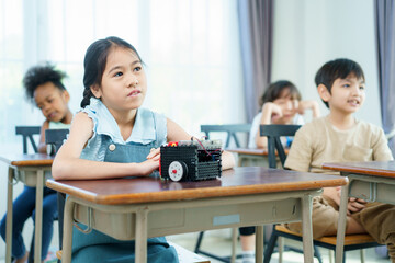 Group of diverse children enjoy learning about the STEM.