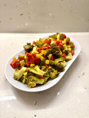 Healthy Homemade Broccoli Salad with olive oil, garlic and vegetables