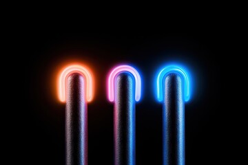 Colorful neon wire bent into three arches against a dark background, showcasing modern design and creativity.