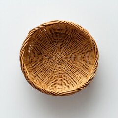 Fototapeta premium Wicker round basket on a white background