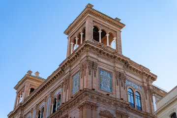 Obraz premium Edificio Coliseo Building (ehemaliges Teatro Coliseo) in der Avenida de la Constitucion Straße - Sevilla, Andalusien, Spanien
