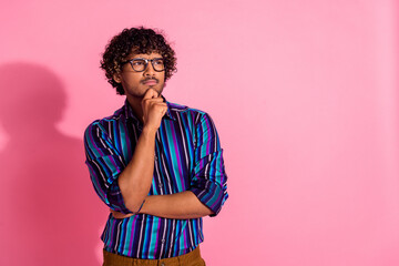 Photo of nice young man look empty space wear shirt isolated on pink color background