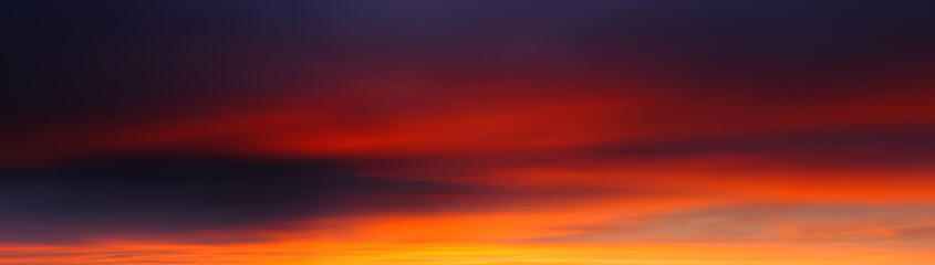 Afterglow in panoramic sky with smooth clouds, with surreal beauty