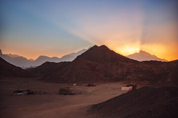 Majestic desert sunrise over mountainous landscape