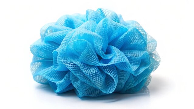 Blue mesh pouf bath sponge washcloth single object isolated on white background closeup photo. Soft synthetic shower wash cloth.Washing hygiene clipart design element. Spa body care accessory product.