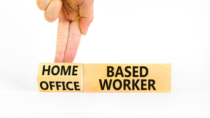Home or office based worker symbol. Concept words Office based worker Home based worker on wooden cubes. Beautiful white background. Business, home or office based worker concept. Copy space.