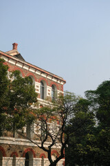 Museum building in Red Fort, India, Delhi. Historic building with arched windows and brick facade