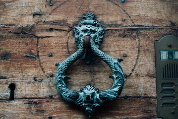 antique door knocker in Bergamo, Italy