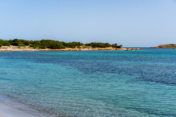 Wild beach with turquoise water in the coast of Sardinia, Italy