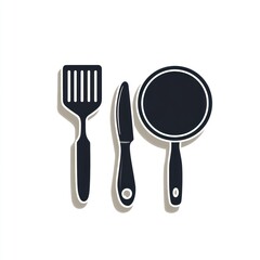 Cooking tools including a spatula, knife, and pan on a white background, for food or kitchen use