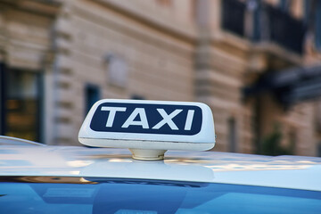 Rome Taxi sign close-up view