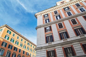 Roman building facade with the blue sky on the background