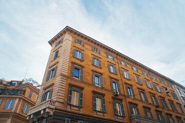 Roman building facade with classic italian windows