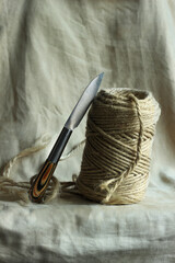 Vintage Knife and Twine on Neutral Fabric